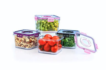 Set of transparent food storage containers with pink lids on a white background