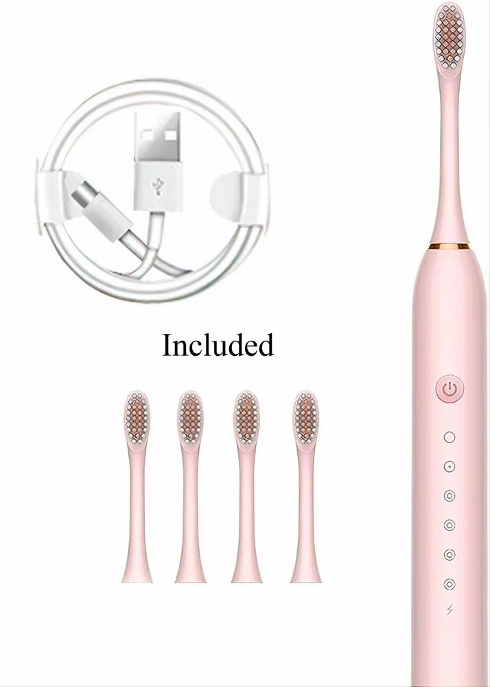 Pink electric toothbrush set with four brush heads and charging cable on a white background